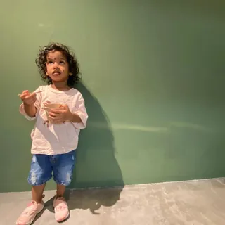 A very small customer, mid-bowl, against our green wall