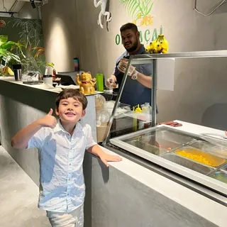 Choosing a gelato flavour at the counter