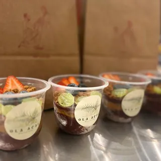 Three takeaway bowls ready for collection