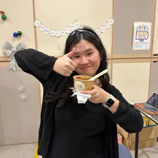 Bowl in hand at a company celebration