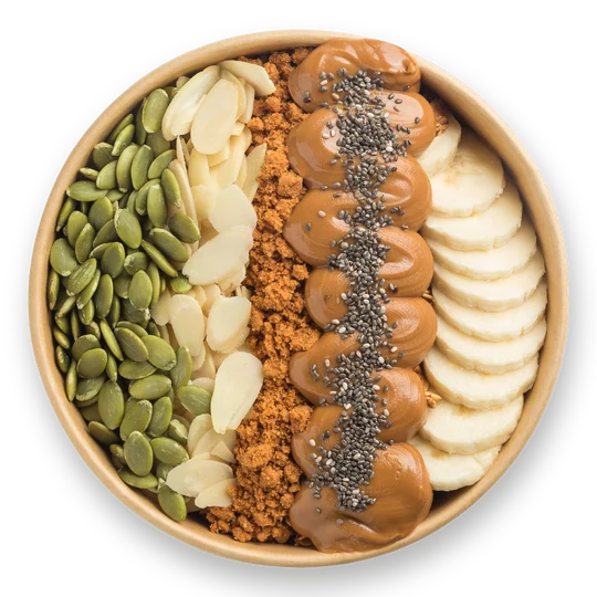 Nutz 4 Nuts bowl — açaí topped with pumpkin seeds, almond slices, lotus crumbs, drizzle, chia seeds and banana